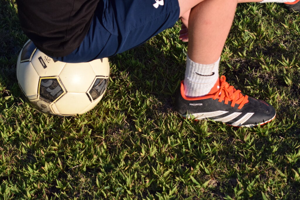 soccer player sitting