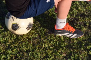 soccer player sitting