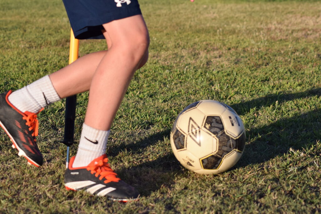 Youth Player Dribbling the ball