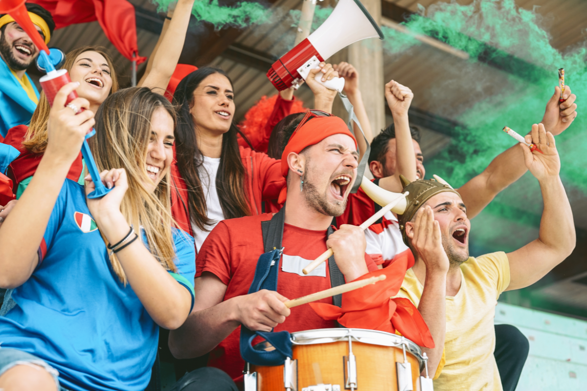 Parents and adults cheering during game day