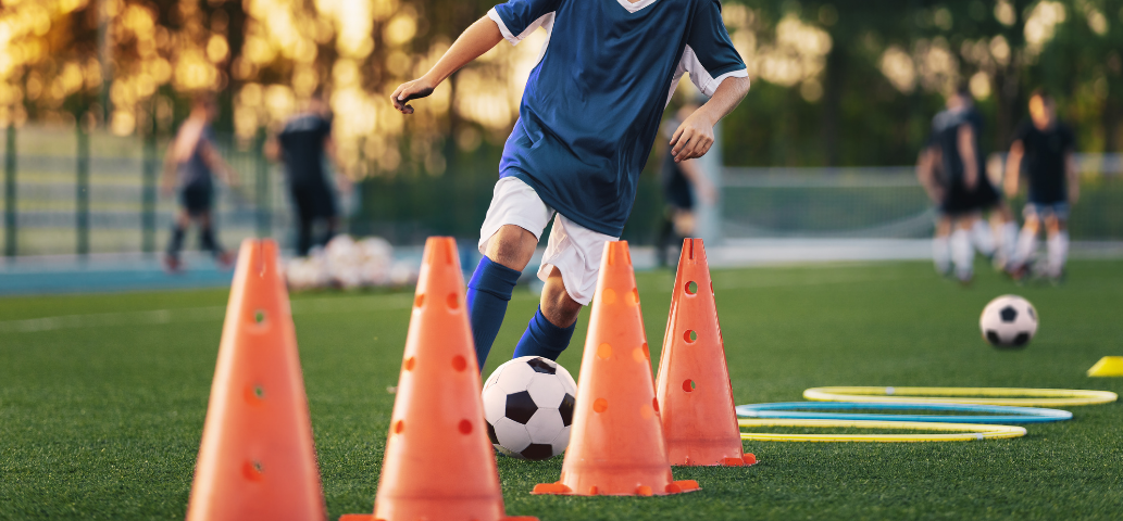 youth soccer player dribble drill