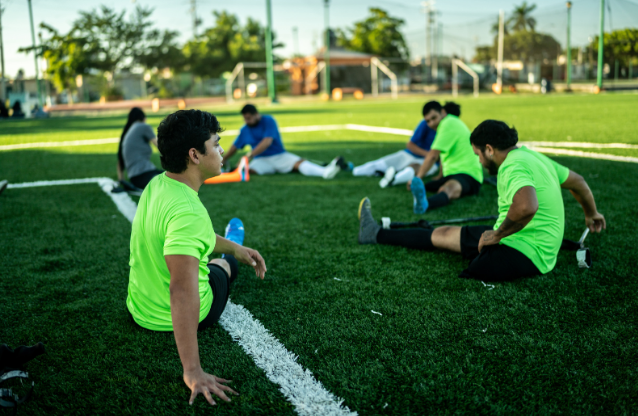 soccer team stretching